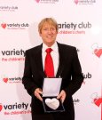 Joe with his Variety Club Silver Heart Award March 2010