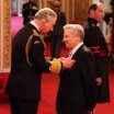 Joe Longthorne receiving his MBE from HRH Prince of Wales