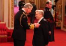 Joe Longthorne receiving his MBE from HRH Prince of Wales