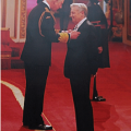 Joe Longthorne receiving his MBE from HRH Prince of Wales at Buckingham Palace Dec 13 2013