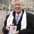 Joe Longthorne with his MBE at Buckingham Palace Dec 2013