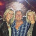 Joe Longthorne with Kim Sutherland and Angela Woodward.